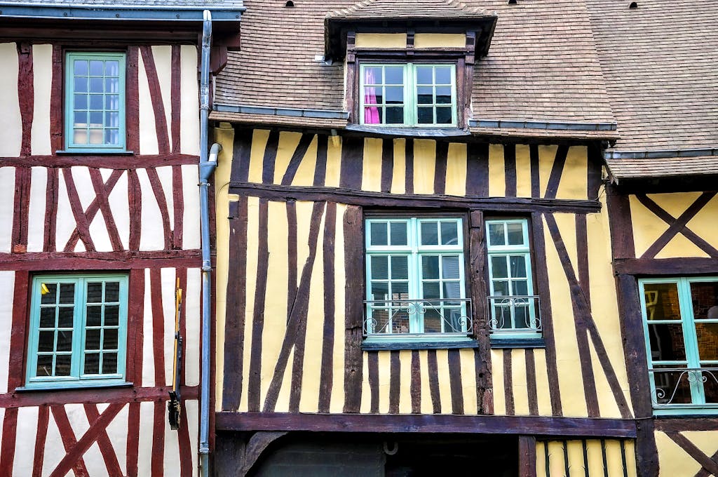 Charming medieval half-timbered houses in Rouen, showcasing traditional architecture.