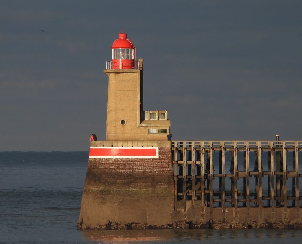 Striking view of the Fécamp Lighthouse overlooking the English Channel in Normandy.